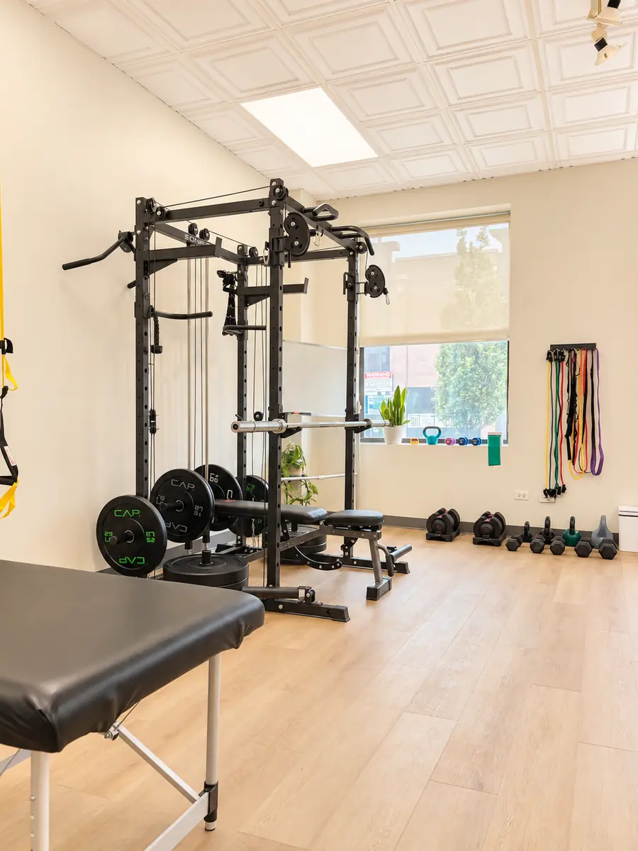 Bright treatment and exercise space at the Form and Function Lincoln Park clinic